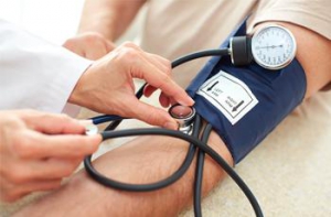 Blood pressure cuff on patient